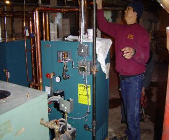 Burnham steam boiler installed in Lynnfield, MA provided by the National Grid oil to gas conversion program