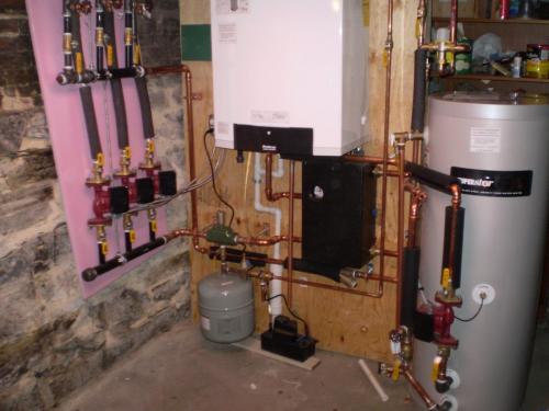 Buderus 95% efficient GB142 hot water boiler with a 45 gallon Superstor indirect hot water heater installed in Cambridge, MA