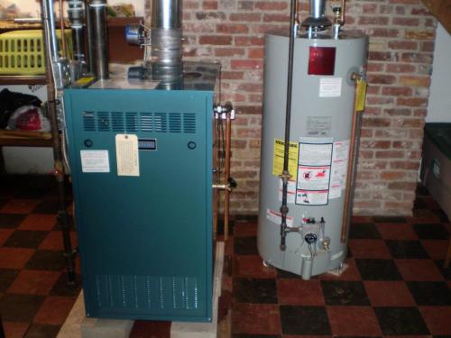 Burnham cast iron hot water boiler with 40 gallon State hot water heater installed in Newton, MA