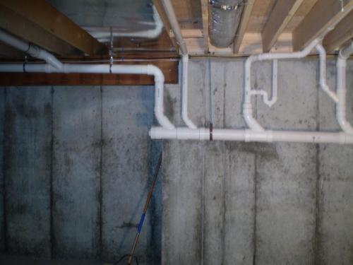 4" main PVC drain in basement installed in Lexington, MA