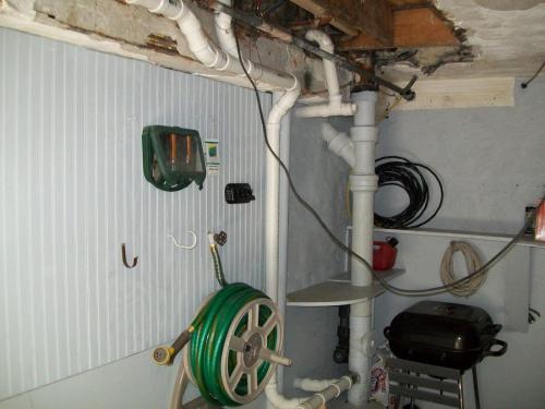 Sump pump installed in a garage in Stoneham, MA 