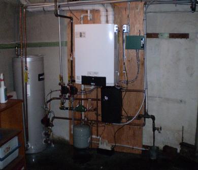 Buderus GB142 95% efficient boiler with a 45 gallon Superstor indirect hot water heater installed Reading, MA
