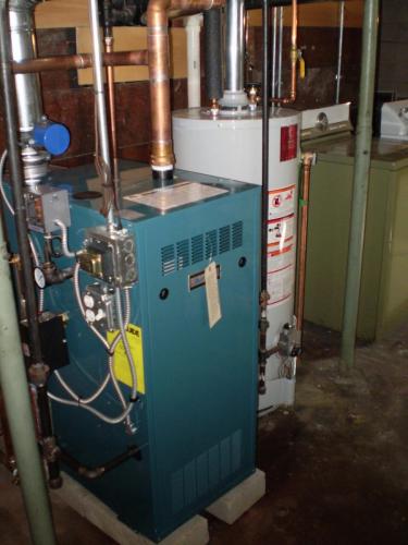 Burnham natural gas steam boiler and State 40 gallon natural gas water heater installed in Winchester, MA.