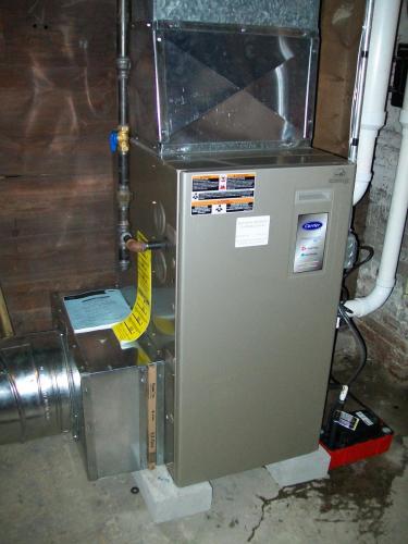 Carrier 95% efficient furnace installed in Cambridge, MA.  This furnace was financed through the MassSave 0% interest heat loan