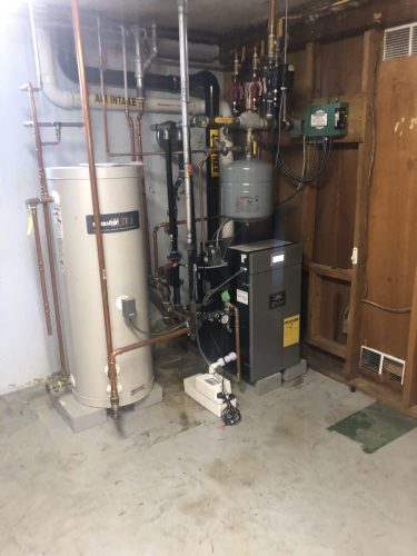 Burnham Alpine high efficiency natural gas boiler installed with a 45 Superstor indirect hot water heater