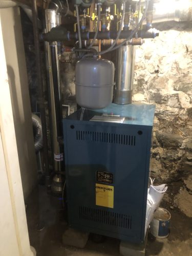 Burnham natural gas hot water boiler with 4 zones of Grundfos pumps and Taco 4 zone control board