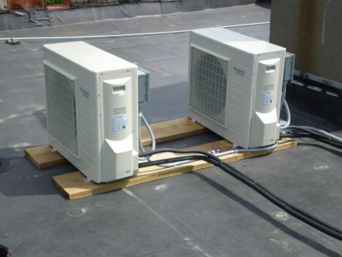 (2) Daikin heat pumps installed on roof installed in Everett, MA